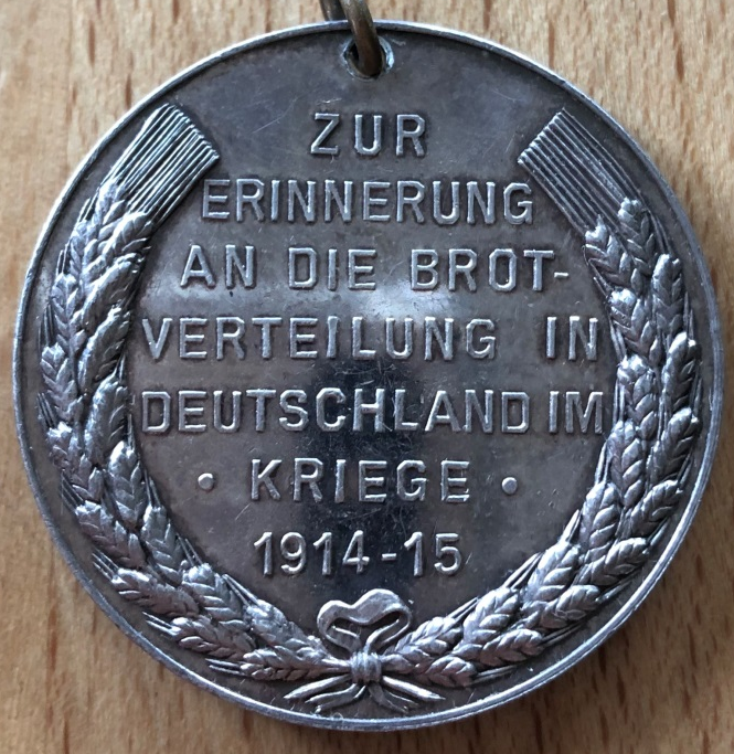 Medaille zur Erinnerung an die Brotverteilung in Deutschland im Kriege 1914 – 1915, Rückseite