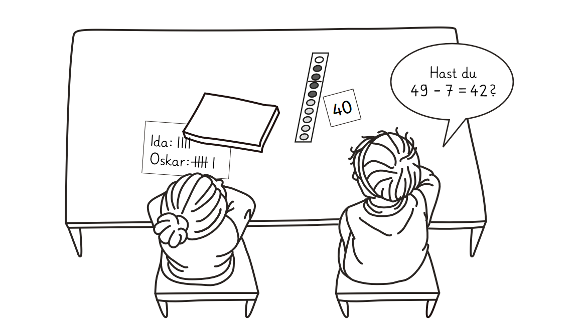 Zwei Kinder am Tisch mit Punktestreifen