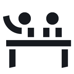 Icon Schüler:in am Schreibtisch